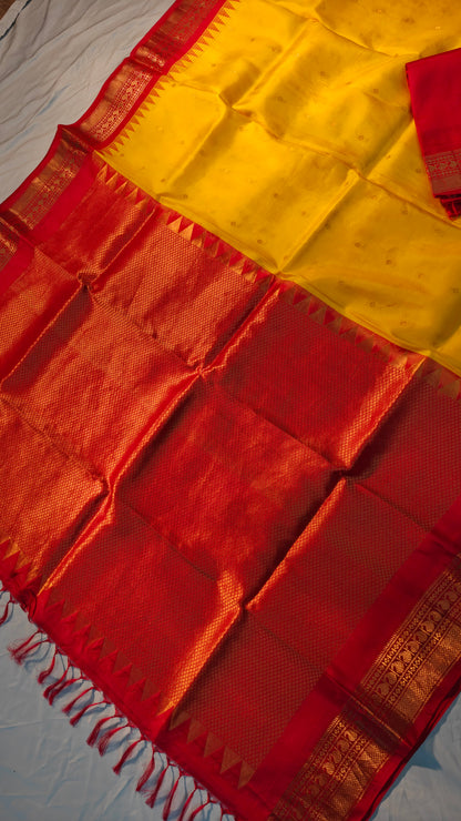 Red and yellow fabric with a pattern on a white background