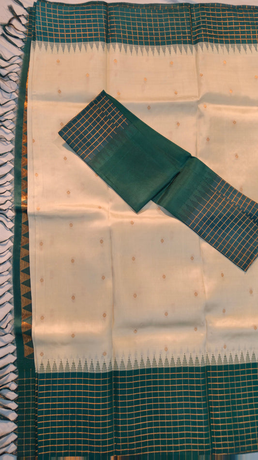 Green and white saree with a checkered pattern